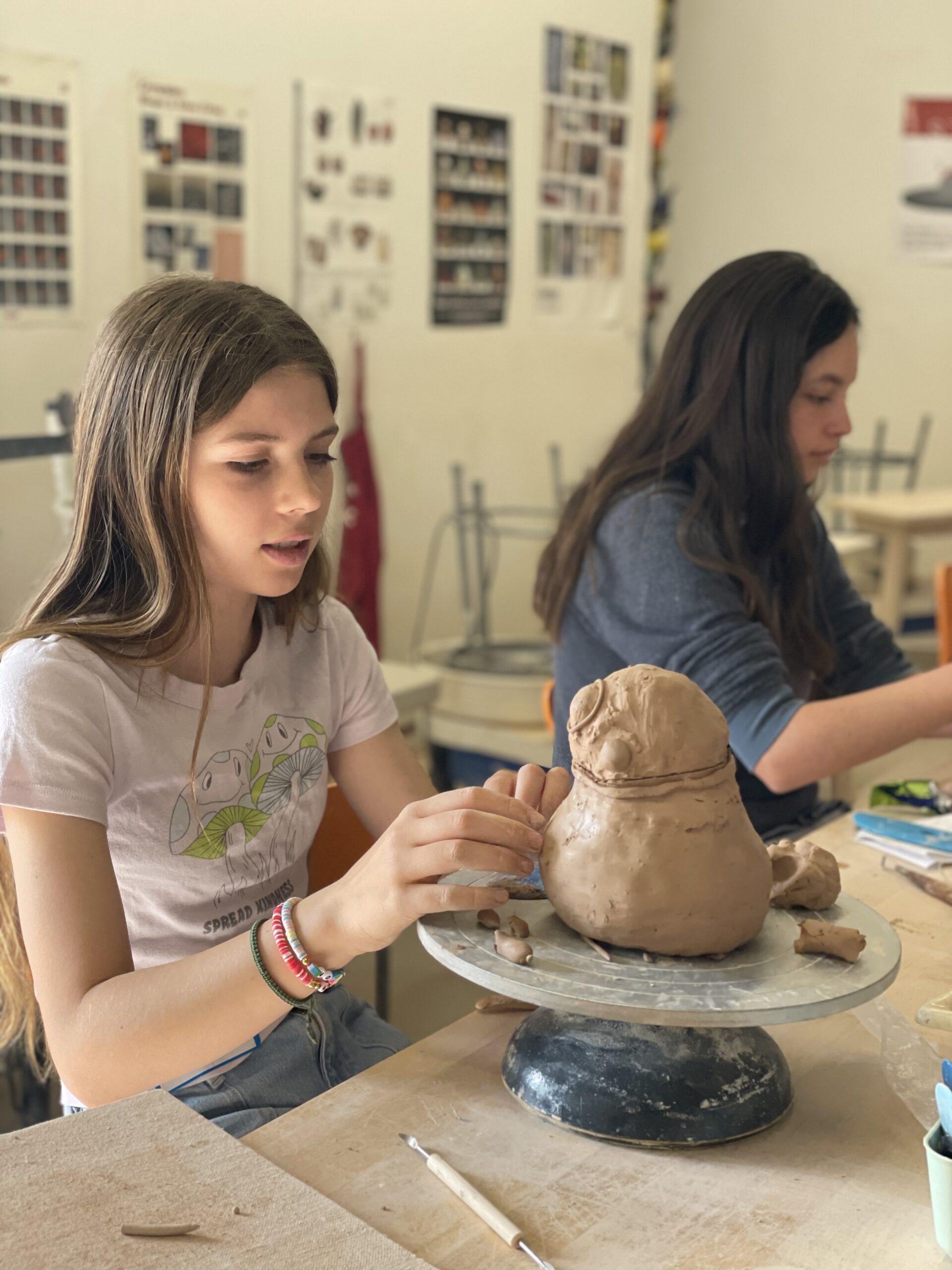 a young student takes an art class for kids at kimball art center in park city