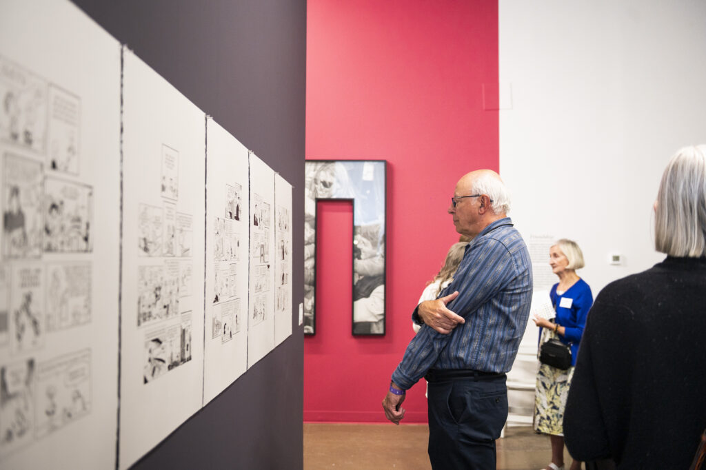 A man views contemporary art on display at Kimball Art Center