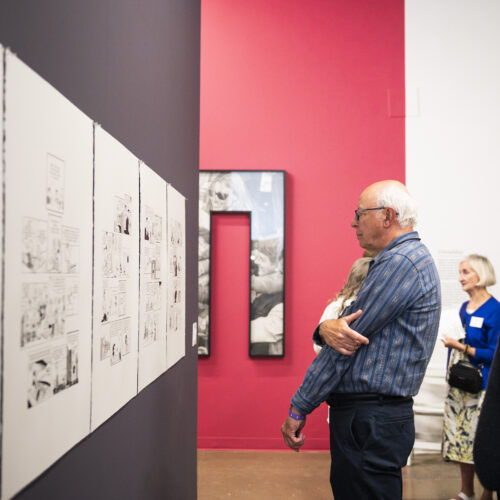 A man views contemporary art on display at Kimball Art Center